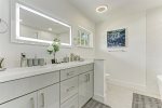 LED mirrors in master ensuite allow for dimming preference 